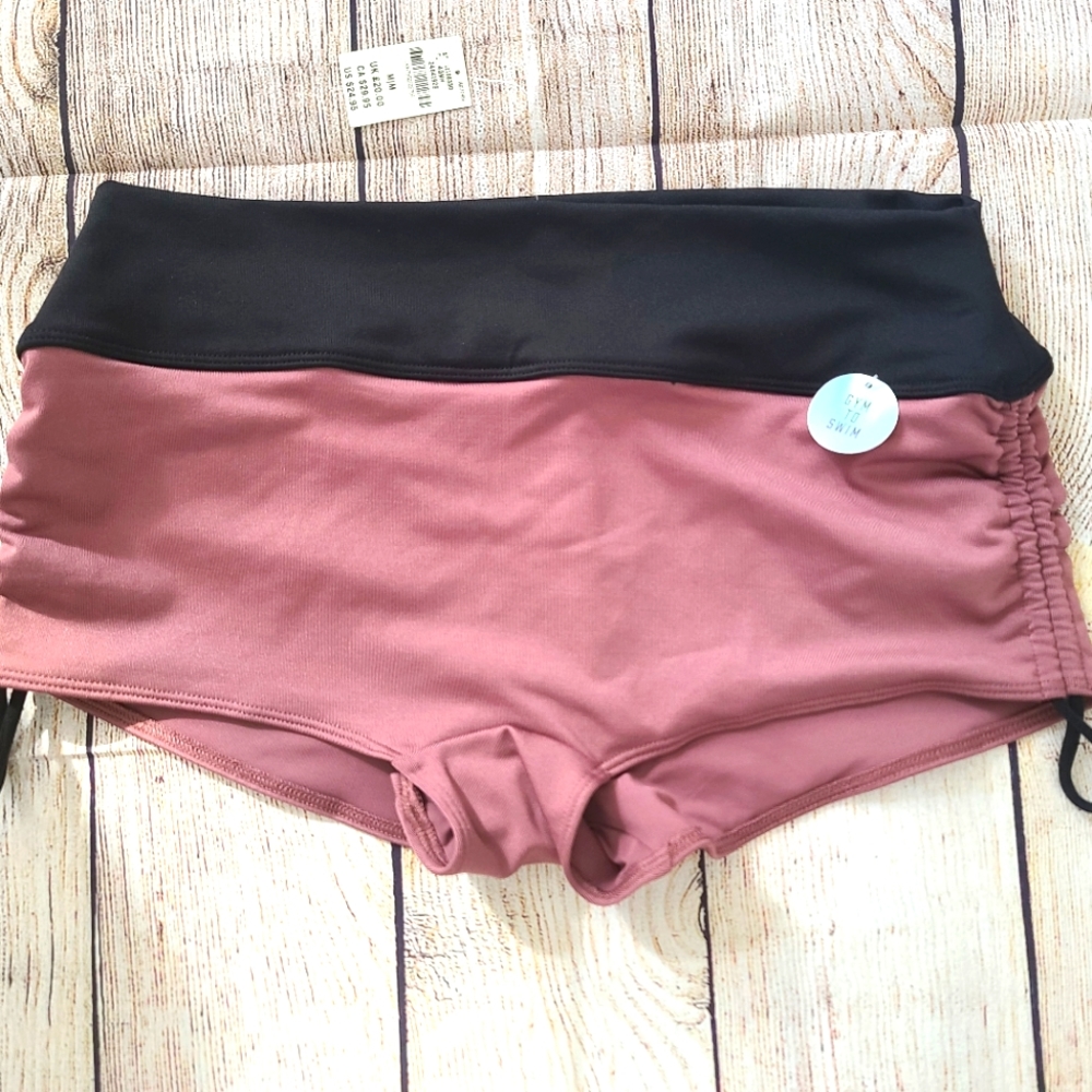 Pink gym to swim boy shorts